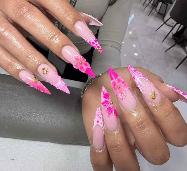 Blue and white French nails with a hand-painted flower