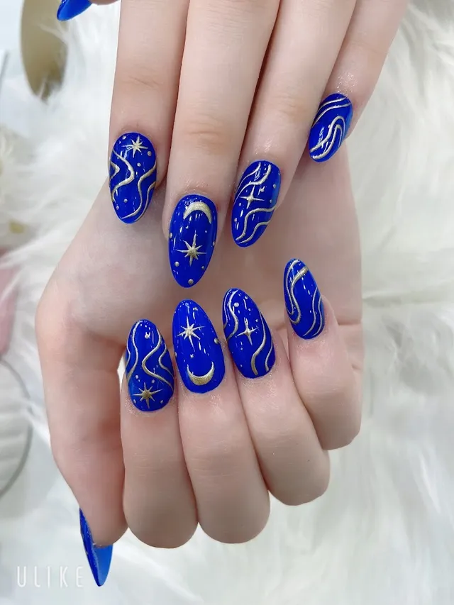Blue celestial star nails