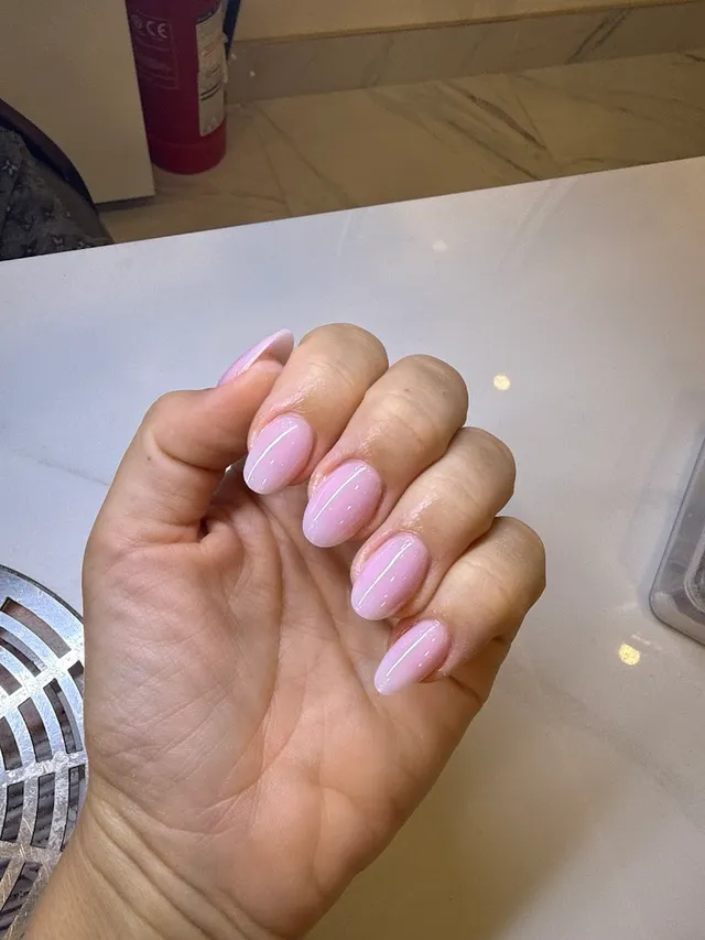 Simple, elegant natural-pink almond nails