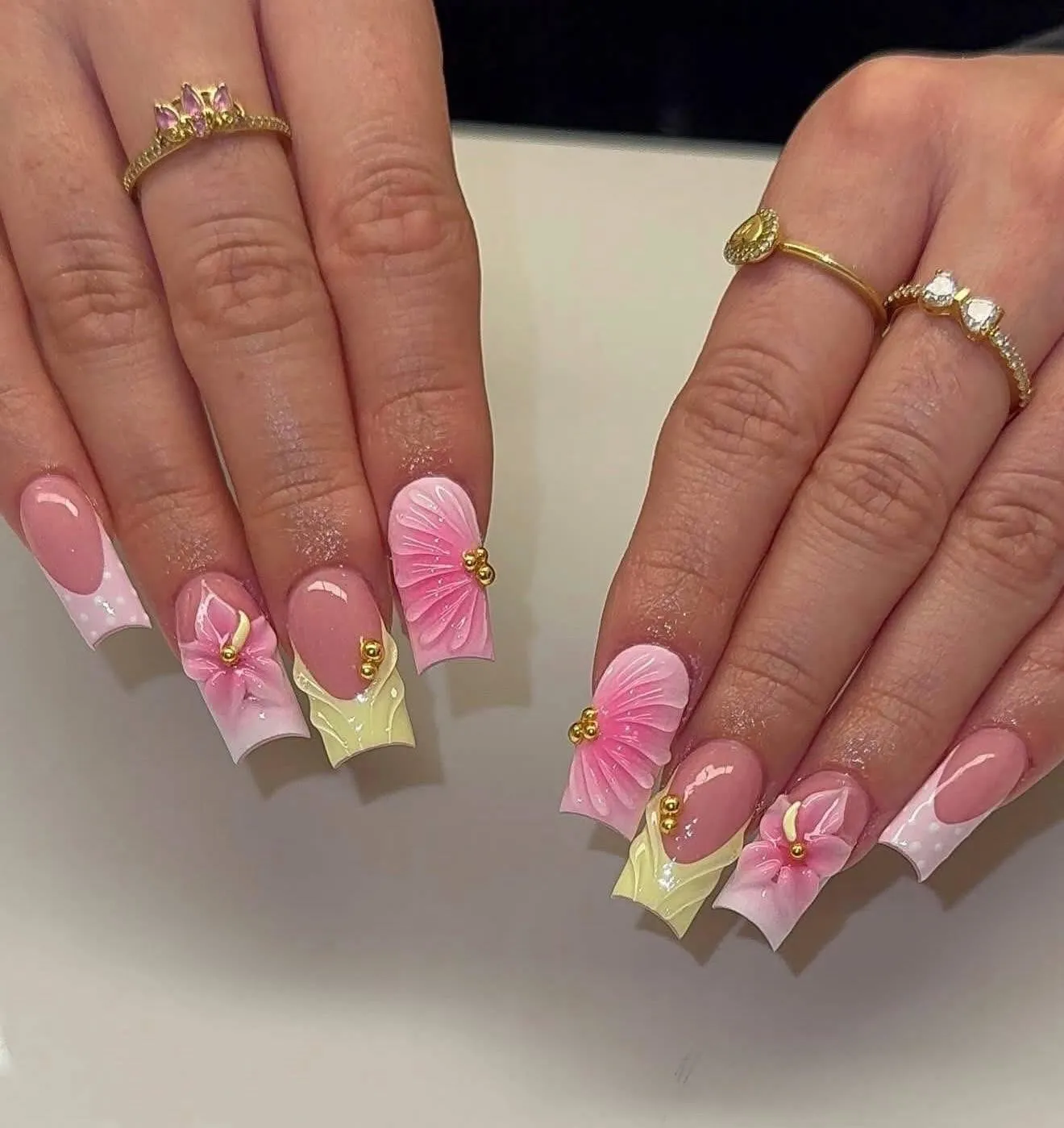 Pink and white French nails with gold charms and 3D flowers by M1 Nails & Beauty, Wakefield