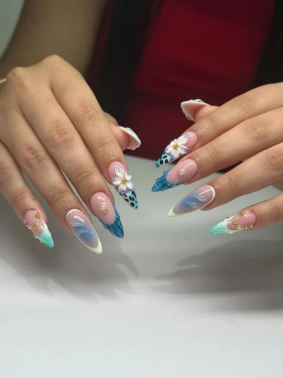 Colourful French tips with hand-painted floral nail art